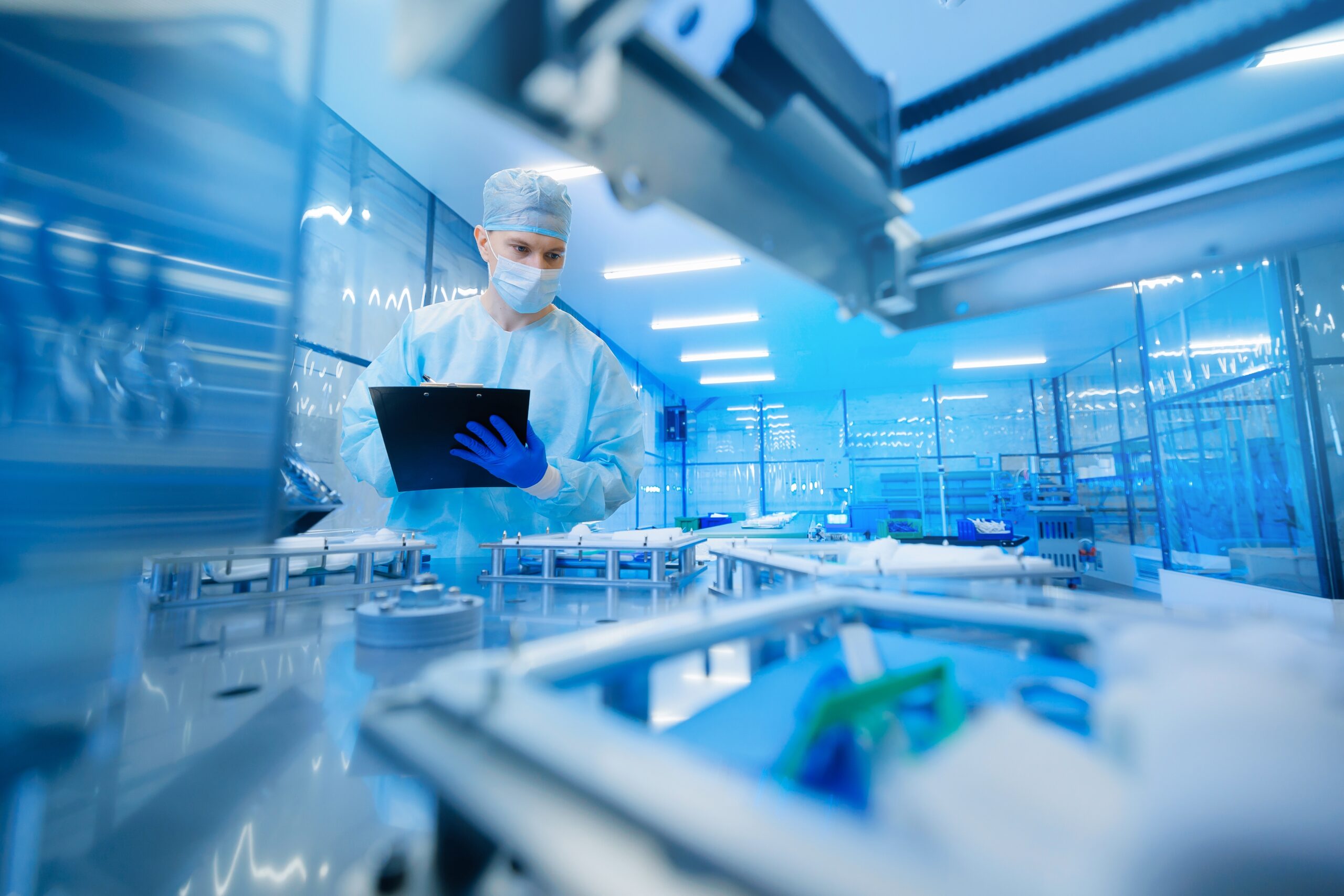 Pharmaceutical,Factory,Worker,Operating,Production,Line,At,Pharmacy,Industry,,Man